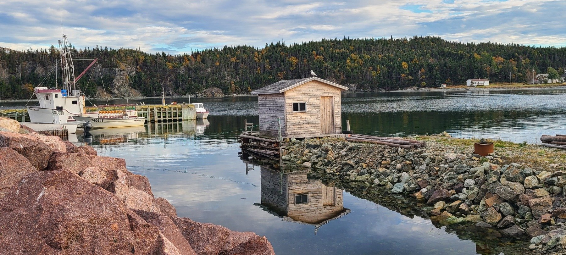 A sheltered harbour and traditional waterfront buildings